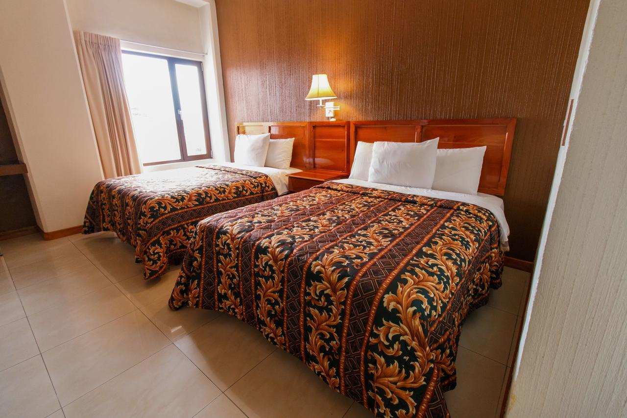 Hotel Anna Inn Olintepeque Quarto foto